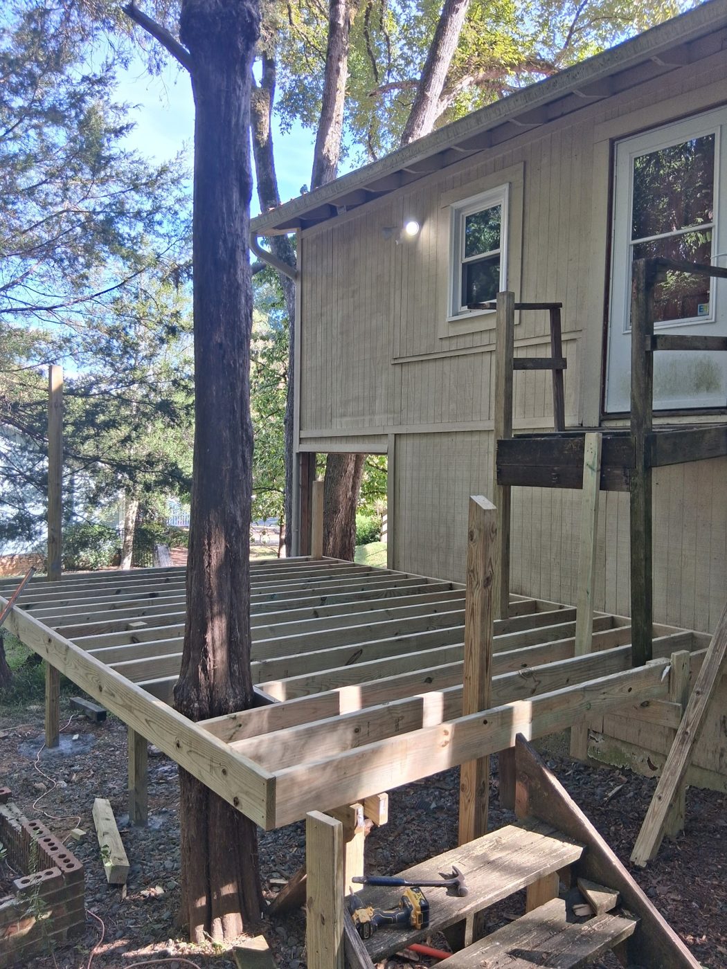 New deck framing under construction by Omni Home