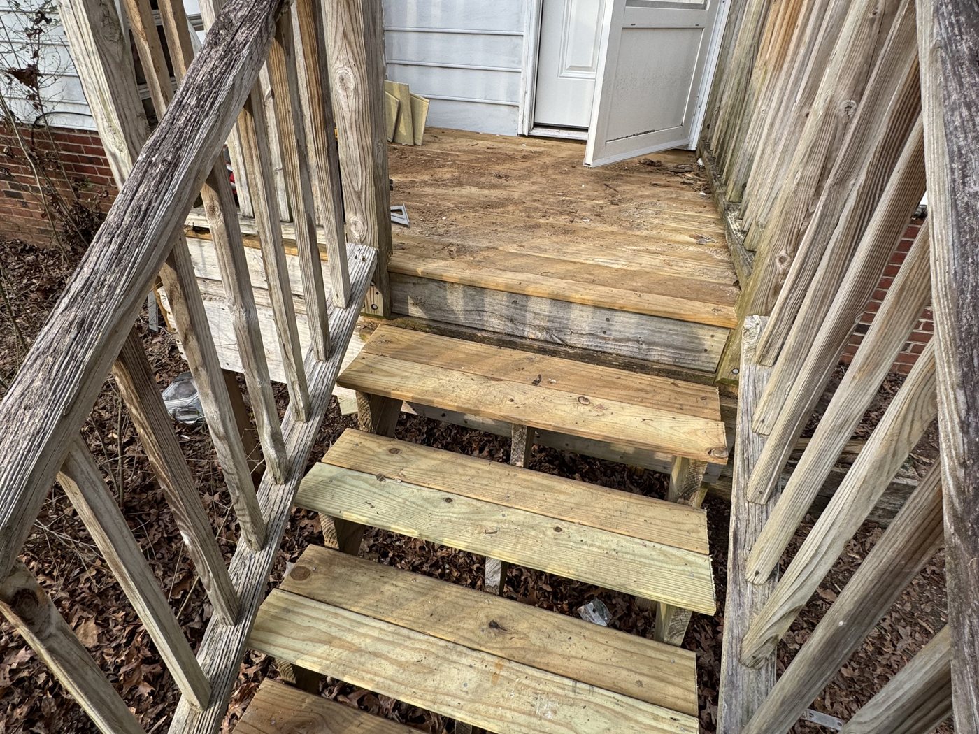 Deck stairs rebuilt with new treads by Omni Home