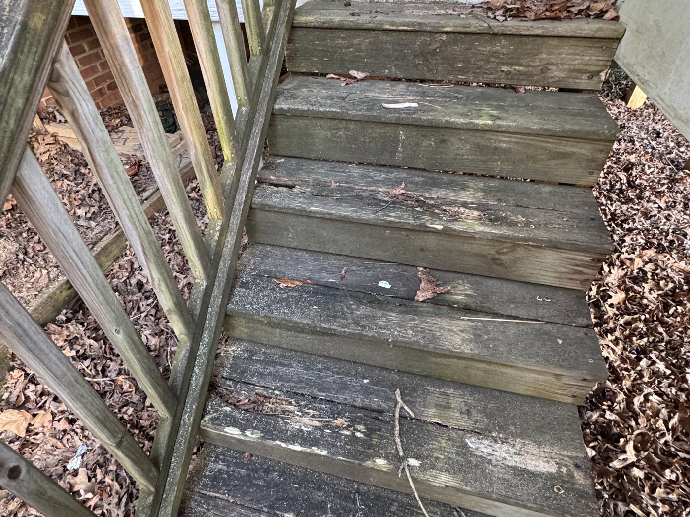 Weathered, worn deck stairs