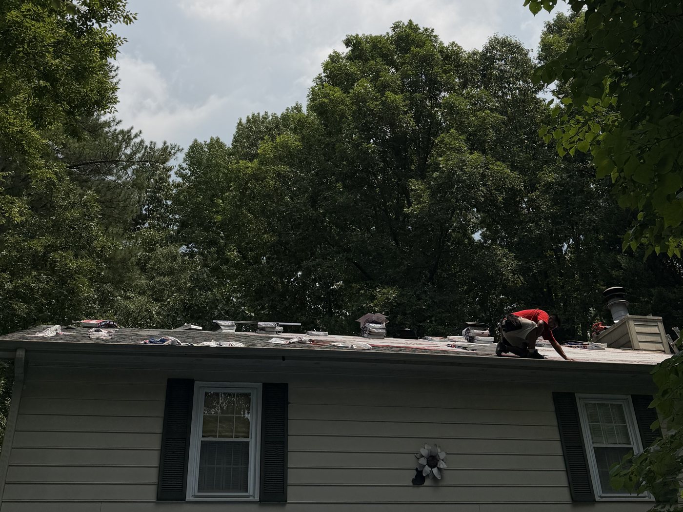 Omni Home crew working on a roof replacement